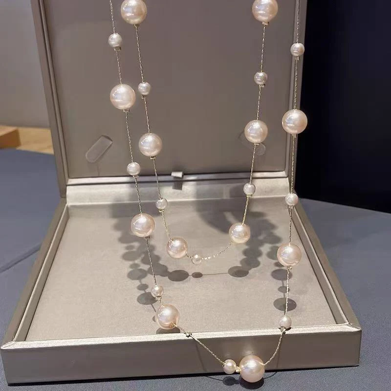 Elegancki temperament wielowarstwowy naszyjnik z łańcuszkiem z pereł towarzyski długi łańcuszek do swetra moda damska biżuteria akcesoria — zdjęcie 6