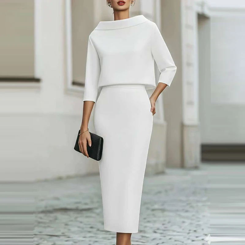 

Элегантный приталенный костюм для вечеринок и официальных мероприятий: комплект из двух предметов (топ с круглым вырезом и рукавом до локтя + юбка) для офиса