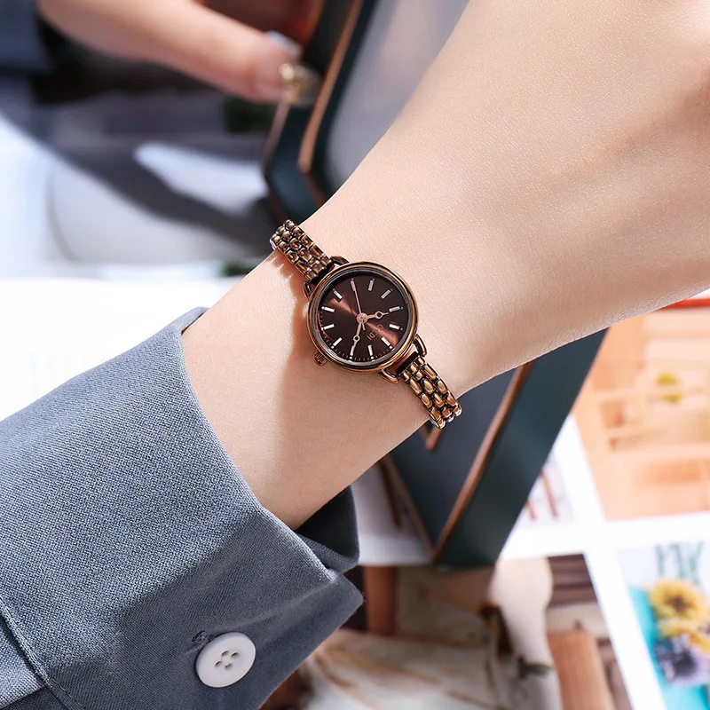 Versione coreana semplice da donna dell'orologio al quarzo impermeabile in lega con cintura fine di alto valore. Orologio da polso premium per studenti