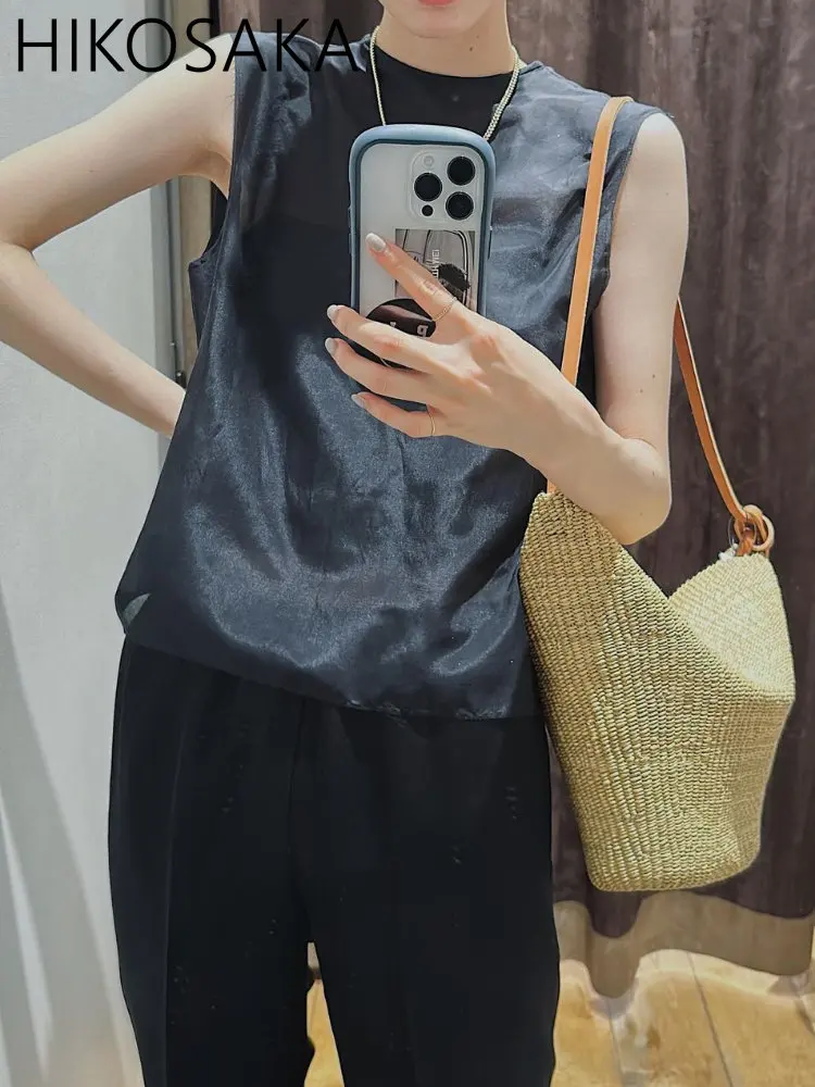 Japan neue Sommer sexy halb transparente ärmellose Tops elegante einfarbige französische Stil lose Tank Top All-Match-Pendler hemden