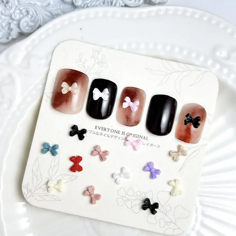 50PCS 3D Mini Minimalist Bow Nail Charms Solid Color Resin Bowknots Sweet Style Nail Art Decorations for DIY Manicure Supplies