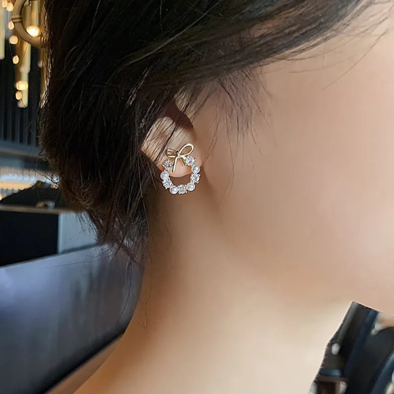 Hollow Out Round Rhinestones Bow Stud Earrings for Women Temperament Fashion Imitation Pearl Ear Studs Party Wedding Jewely K1 Image 4