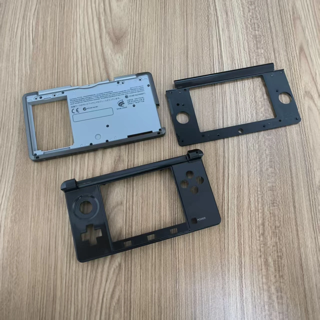 Scatola protettiva a conchiglia per copertura alloggiamento con cornice centrale colorata originale per console 3DS