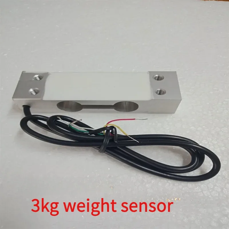 

Electronic weighing quantitative sensor for quantitative tea grain packer