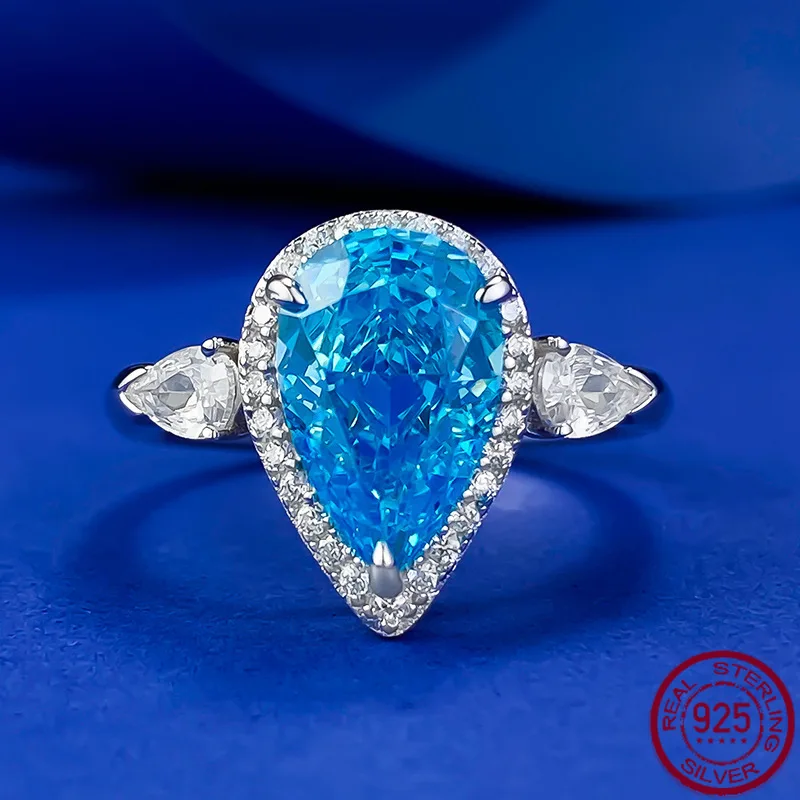 

New European and American 7 * 11 Pear shaped Sea Blue Diamond S925 Pure Silver White Gold Diamond Ring Wedding Jewelry