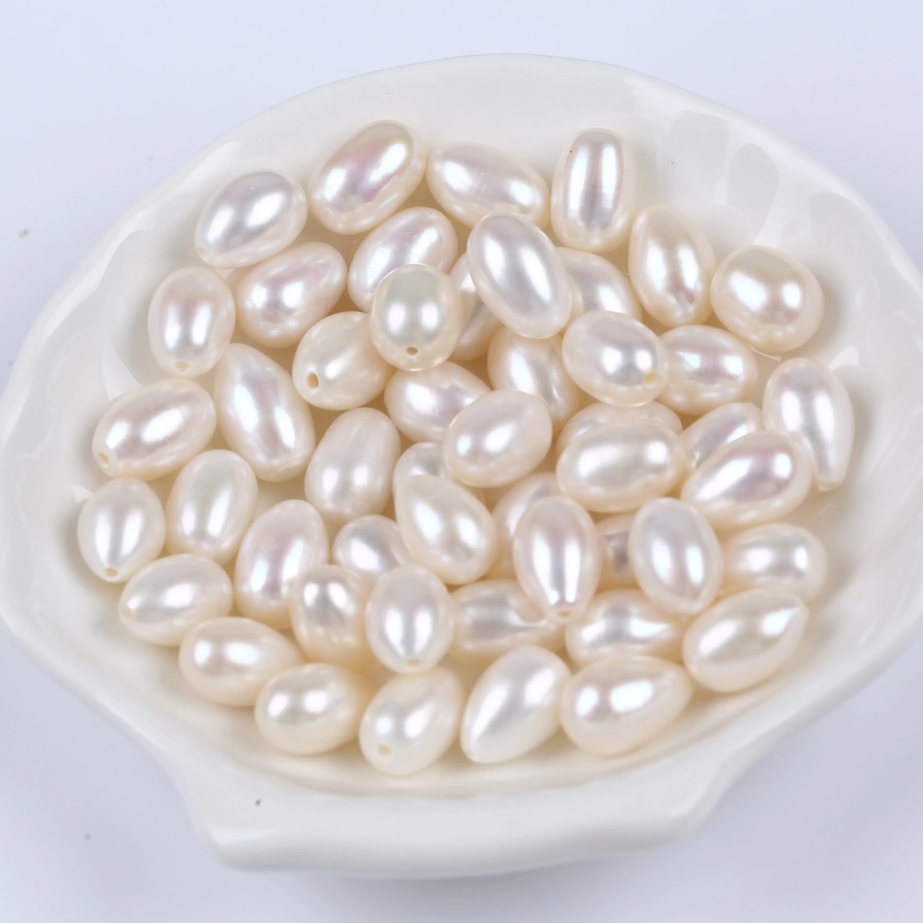 

Wholesale Jewelry Making Natural White 9-10mm Loose Rice Freshwater Pearls Beads