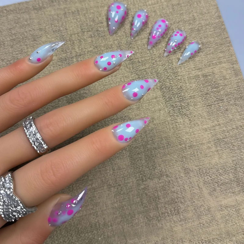 10PCS of light blue dagger-shaped fake nails, decorated with hand-painted hot pink dots, paired with mini silver metal rivets