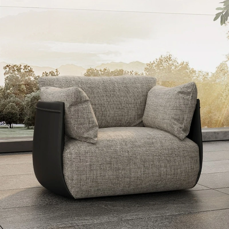 Single sofa living room balcony hotel homestay leisure lazy recliner light luxury high-end designer cotton and linen fabric