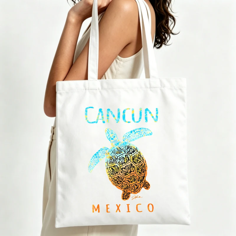 Women's sea turtle graphic canvas tote bag with letter print, ideal for beach outings and casual summer use