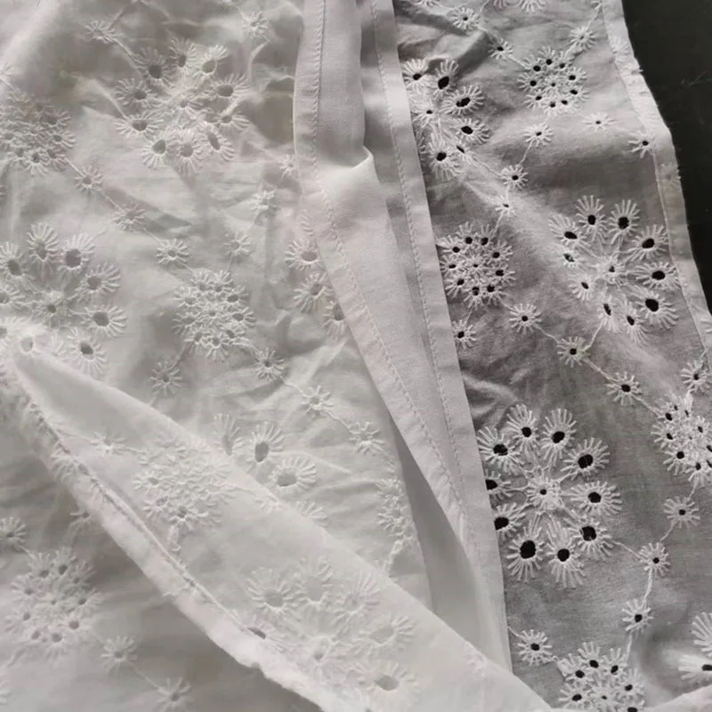 Mini robe blanche élégante pour femmes, Sexy, col en v, œillets brodés, détail noué, sans manches, robe de plage, mode été