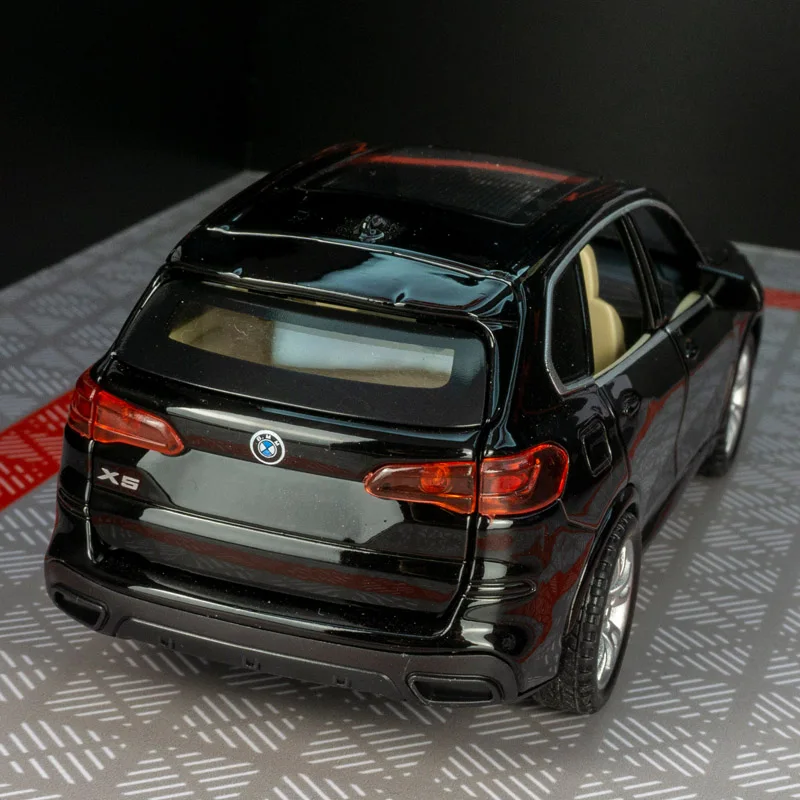 

1:32 BMW X5 SUV Alloy Car Model four doors and the front hood and trunk door can be opened has sound and lighting rich details