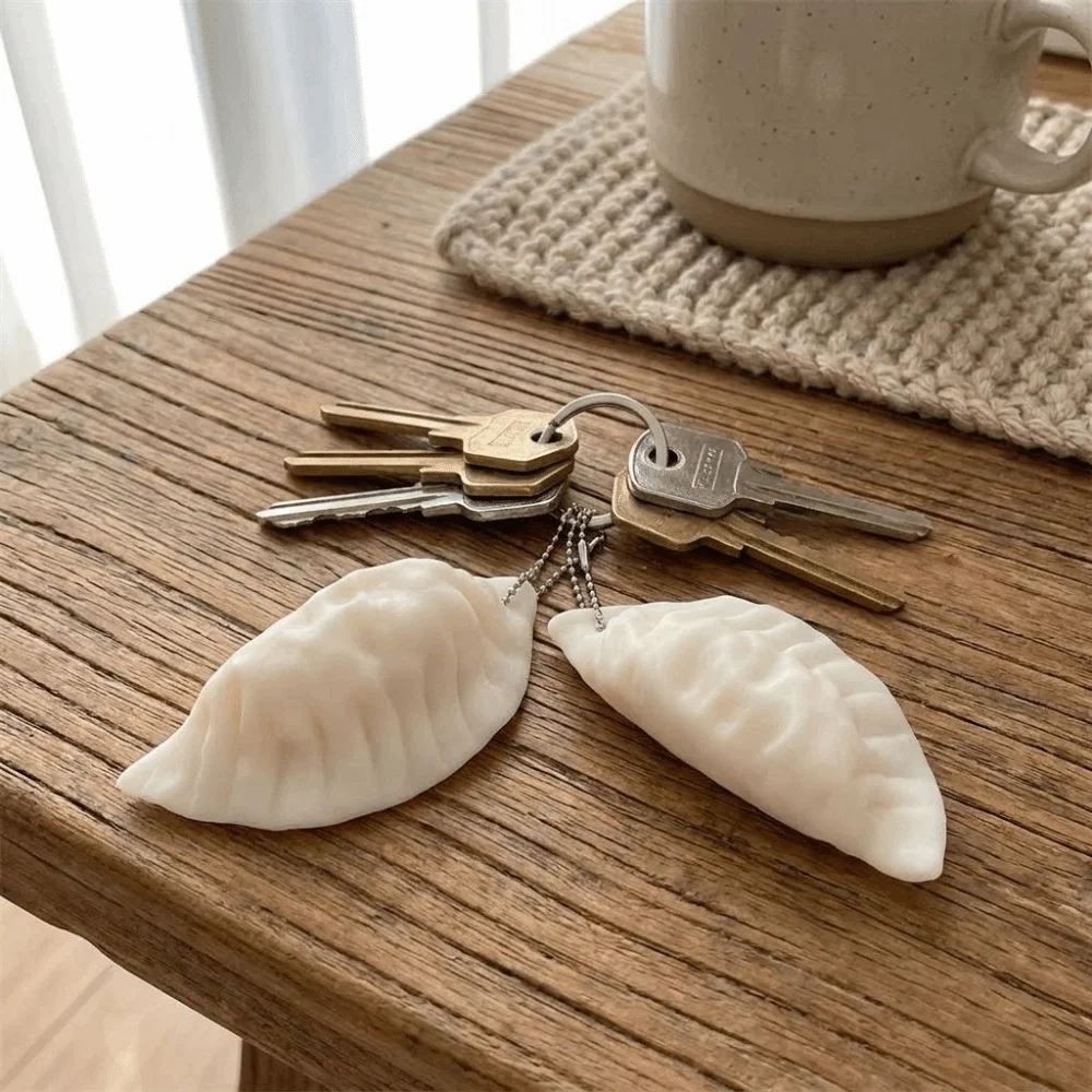 Novelty Funny Simulation Dumpling Keychain Soft Pinch Lifelike Squishy Keychain Realistic Mini Food Pendant Gift