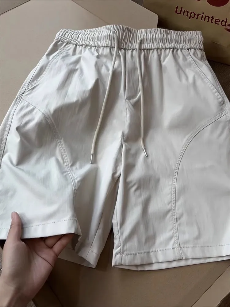 

Qui Dry Ice Silk orts Мужские летние тонкие пляжные брюки в американском стиле с диагональным вырезом Свободный крой для подростков Повседневная мода