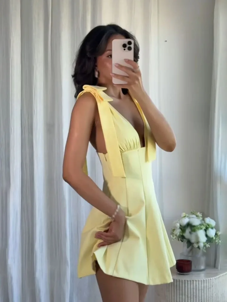 HH dames zomer nieuwe mode slanke mini-jurk geel v-hals mouwloos rugloze rits versieren vrouwelijke sexy chique jurken