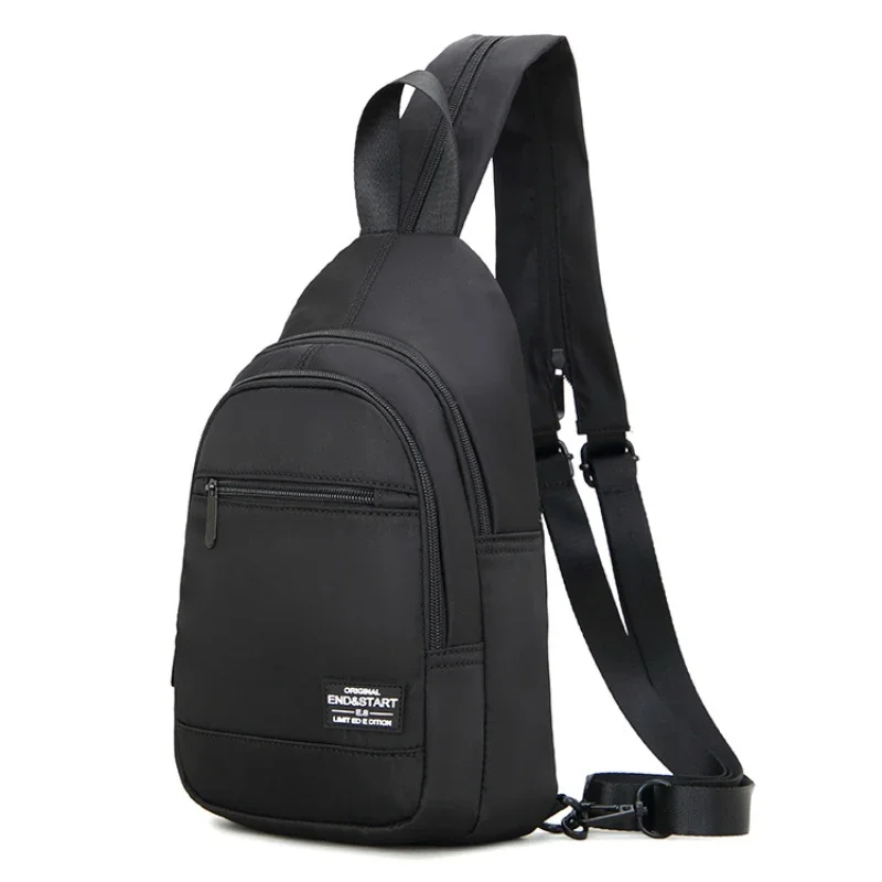 Mini Mochila pequeña de lona para hombre, bolso escolar de hombro, impermeable, para viaje, color negro, 2023