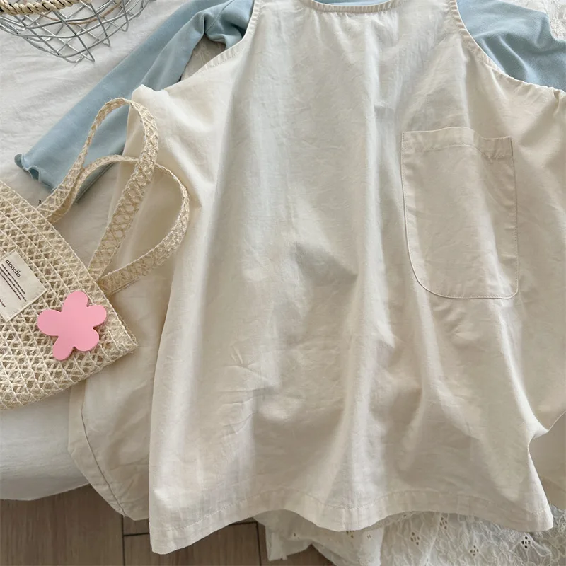 تنورة أنيقة للفتيات لعام 2025 بدون أكمام للربيع والخريف منتج جديد فستان فضفاض بلون سادة مكدس للأطفال