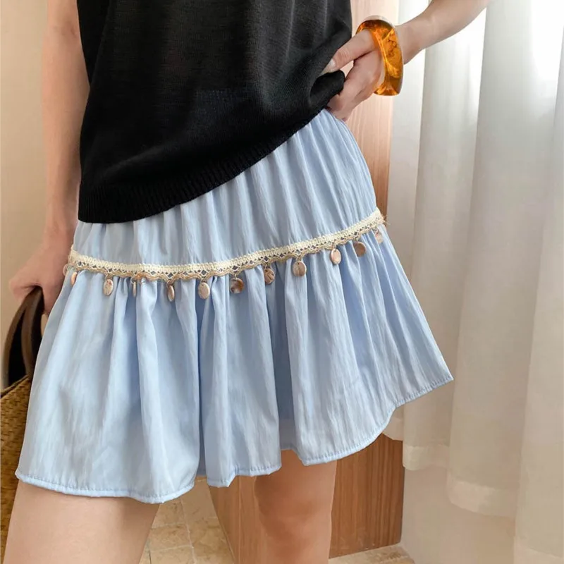 

2025 Summer Women's Mini Slkirt Casual Beach Solid Color High Waisted Tassel Decorative A-Line Skirt
