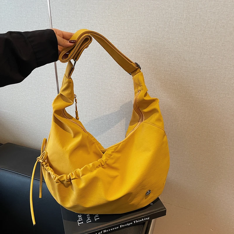 

Solid Color Zipper Casual Shoulder Bags 2026 Fashion Large Capacity Interior Zipper Pocket Design Women's Crossbody Bags