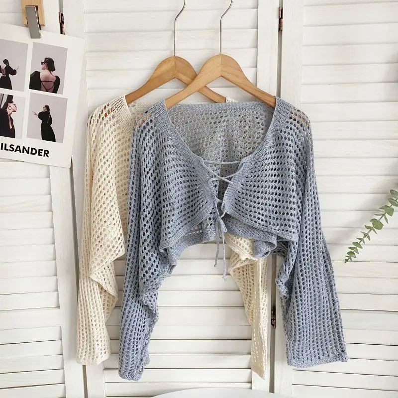 Spring and summer new sweater cardingans sense niche lace up long sleeved hollow short knitted sunscreen cardigan top women