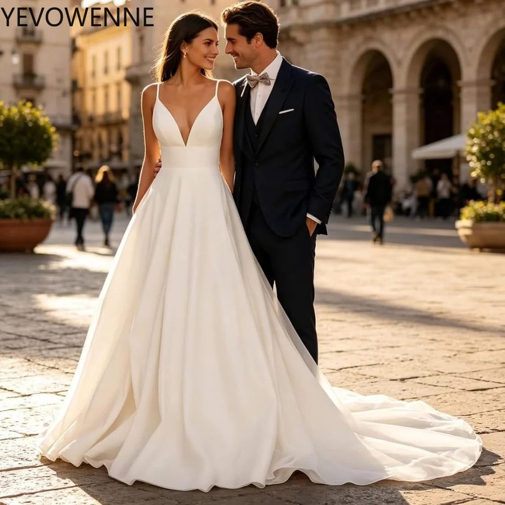 A Line Spaghetti Straps Wedding Dress for Bride Long Train Satin Deep V Neck Bridal Gown with Pockets