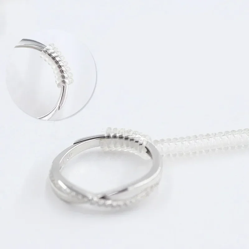 Anello di serraggio a spirale Regola la dimensione Anello di regolazione trasparente Anello di regolazione invisibile Riduttore di dimensioni della