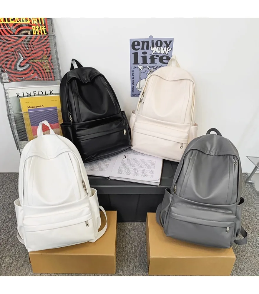 Mochila escolar japonesa simple y versátil de PU para estudiantes universitarias, estudiantes de secundaria y preparatoria, de gran capacidad para computadora.
