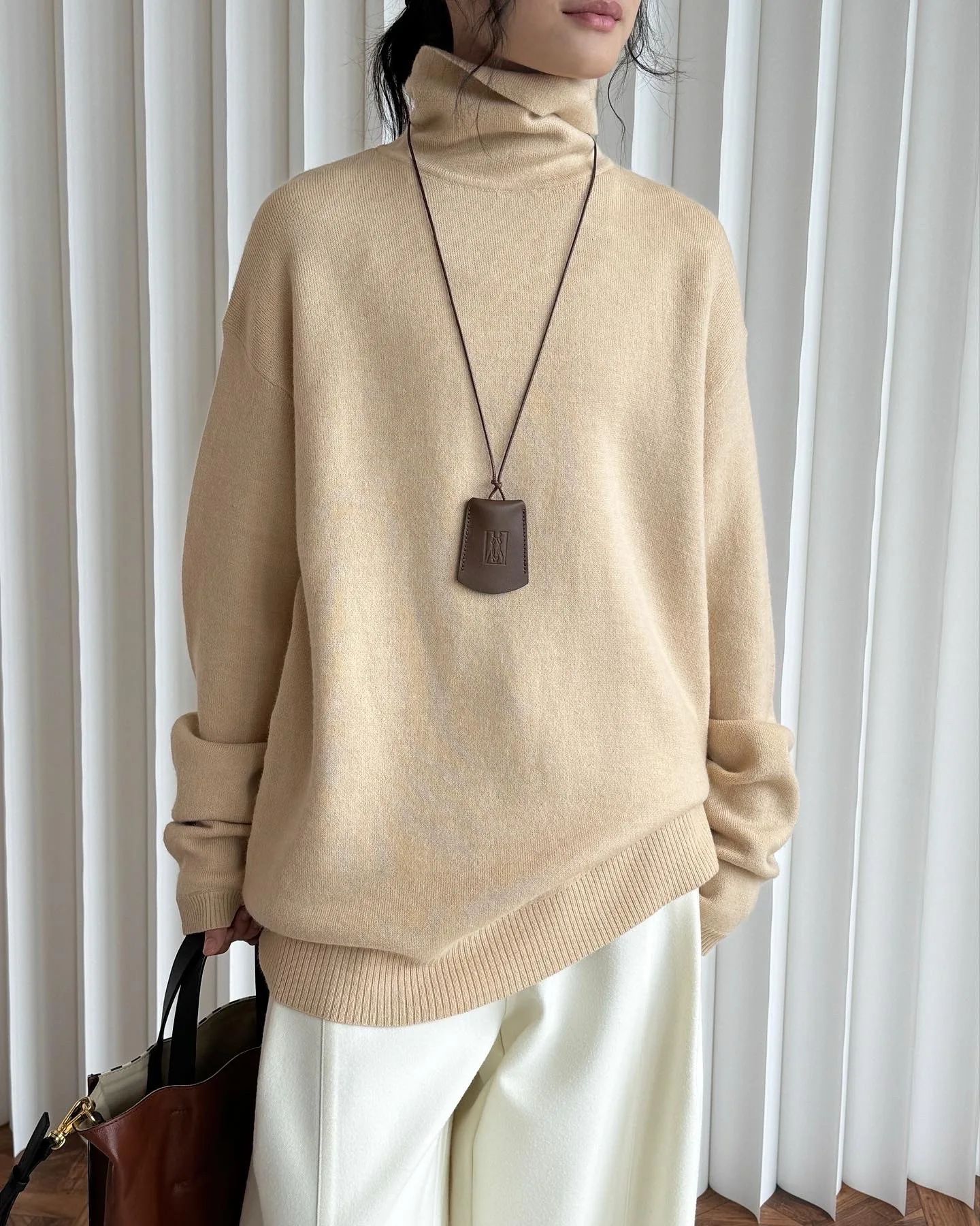 Winter women\'s casual solid color high neck long sleeved loose sweater