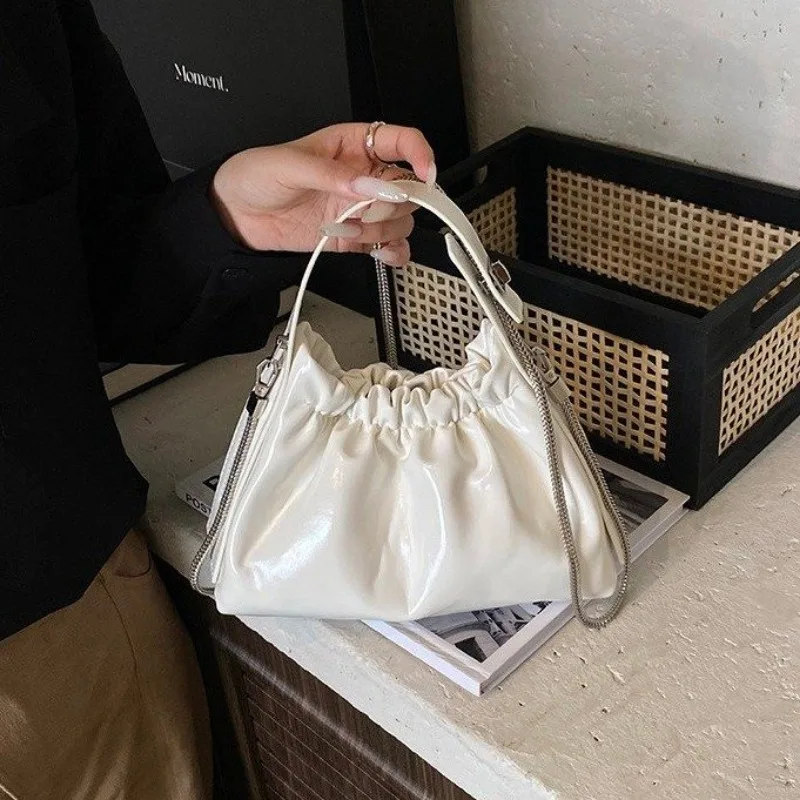 

Новая стеганая мини-сумка 2025 года, женская сумка через плечо с ромбовидной строчкой и верхней ручкой, трансформируемый клатч через плечо «день-ночь»