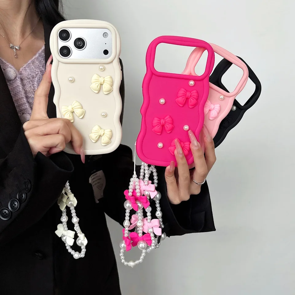 Funda Coreana 3D de Silicona con Moño y Perlas para iPhone 17 Air 16 15 14 13 12 11 Pro X XS XR Max 7 8 Plus con Cordón 5