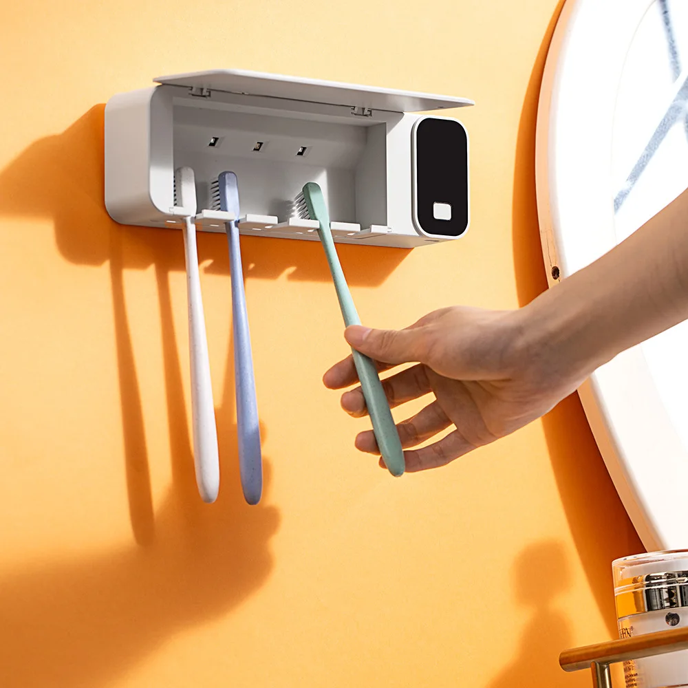 

Многофункциональный высушенный на воздухе нагрев, настенный держатель для стерилизации зубных щеток, беспроводной перезаряжаемый стерилизатор для зубных щеток