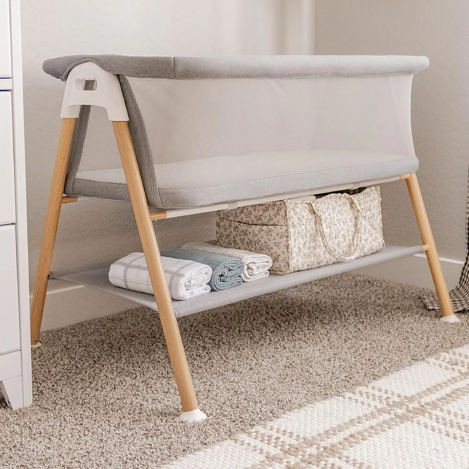 

Essential Bassinet | Includes Breathable Crib Mattress, Portable Design, Mesh Walls, Built-in Storage Shelf, Grey