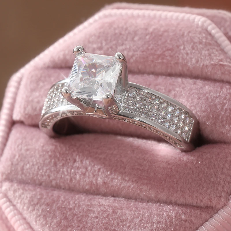 Exquisite silberfarbene, mit weißen CZ-Steinen eingelegte Damenringe, geometrischer Schmuck für Partys und den Alltag. – Detail 5