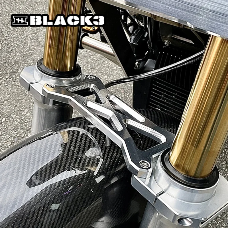 

Усиленная передняя вилка 49 мм для моделей Touring, Road Glide, Street Glide: повышает жесткость, стильный элемент для мотоциклетных систем.