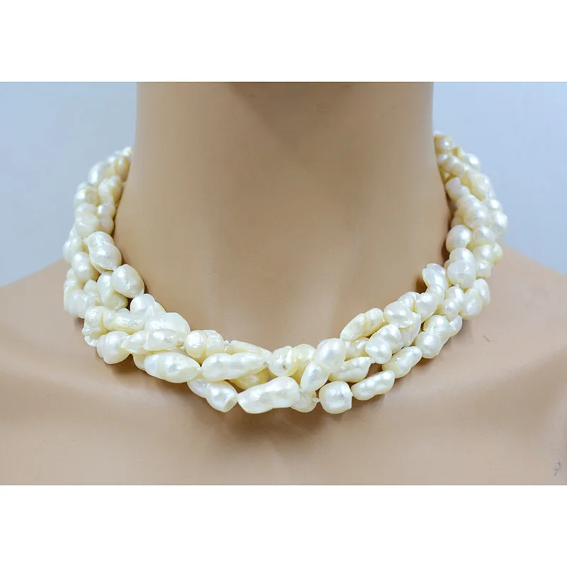 

The last one. 10mm 4-strand natural 8-shaped Baroque pearl necklace 17”