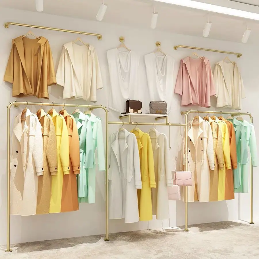 

Clothing store display rack Wall mounted gold display Women clothing store clothes hanger Clothing