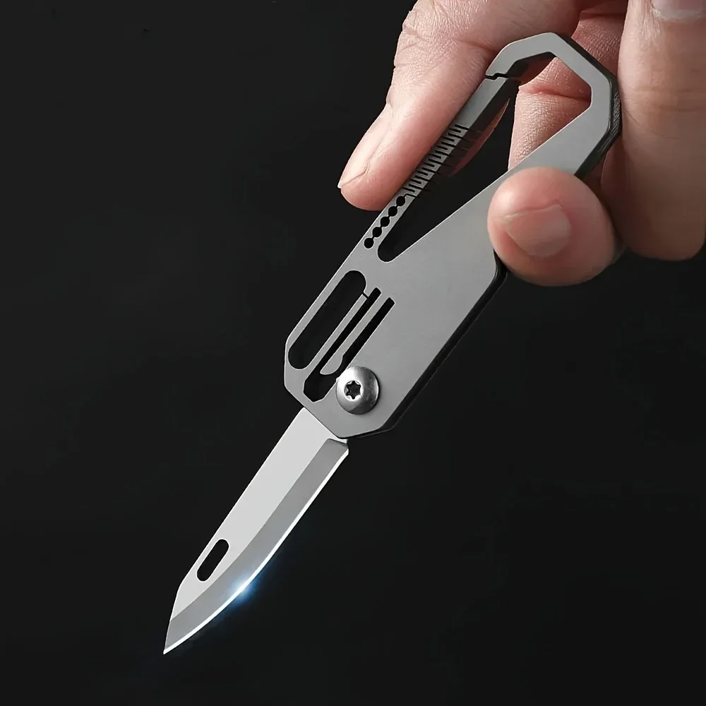 

Titanium alloy portable folding knife, outdoor folding knife, multi-function tool, survival tool, key ring, box opener, camping