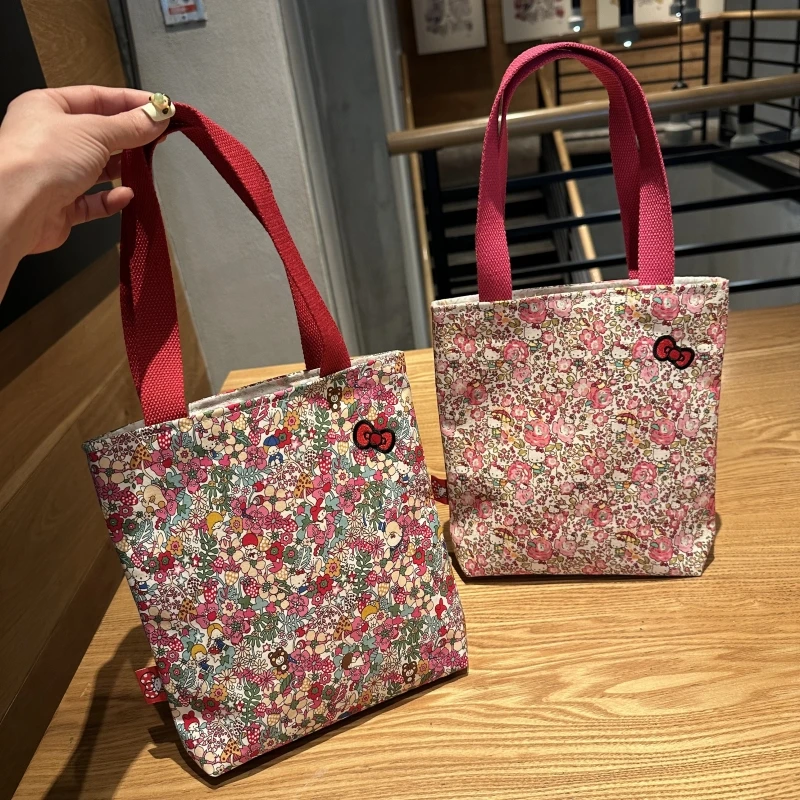 

Kawaii hello kitty cute cartoon double-sided printed fabric handbag single shoulder crossbody bag shopping animation Japanese
