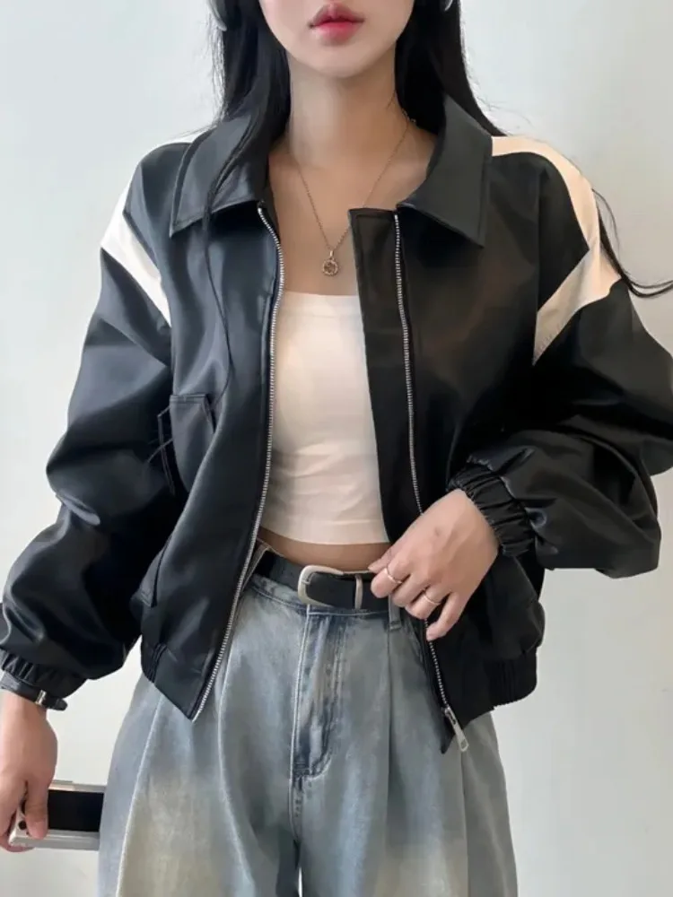 シックな秋のジッパーカラー、オートバイ風レザージャケット、長袖、コントラストカラーの切り替え、レディースファッション