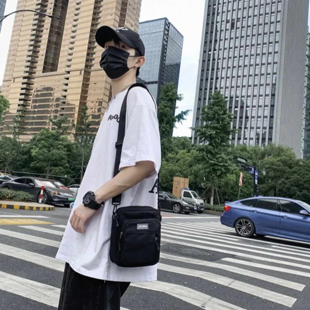 ไนลอนกระเป๋าสะพายชายสแควร์ผ้าใบความจุขนาดใหญ่กระเป๋าสะพายข้างปรับไหล่มัลติฟังก์ชั่กีฬากระเป๋าโทรศัพท์กระเป๋าเดินทาง