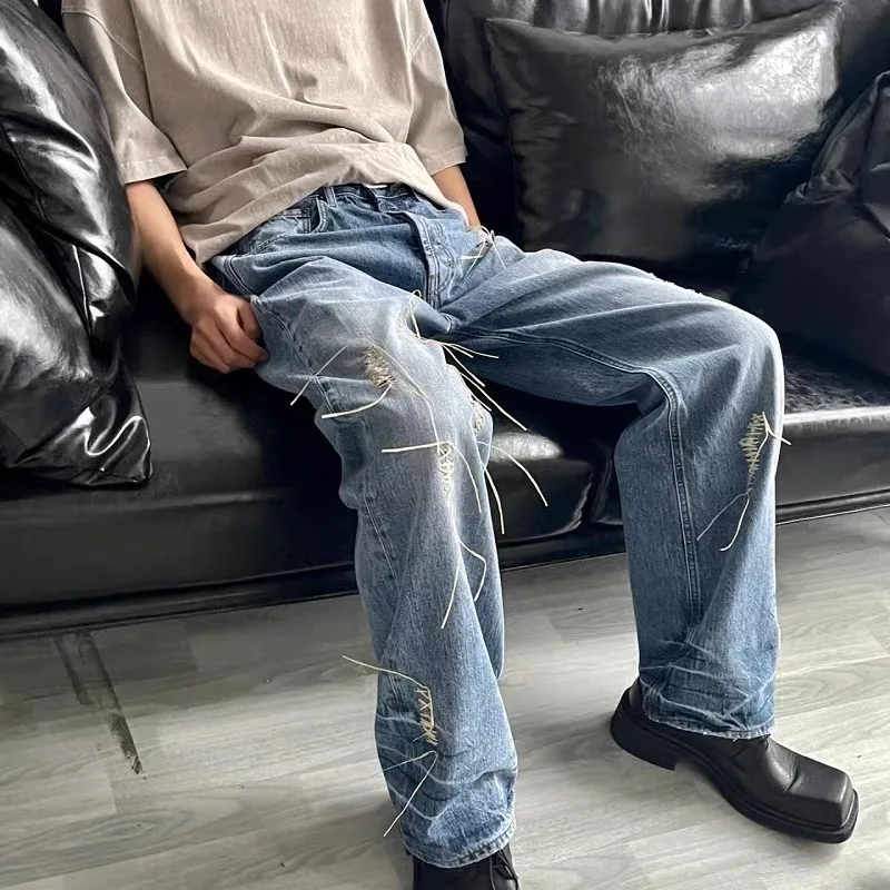 men plastic thread weaving distressed baggy lt blue jean