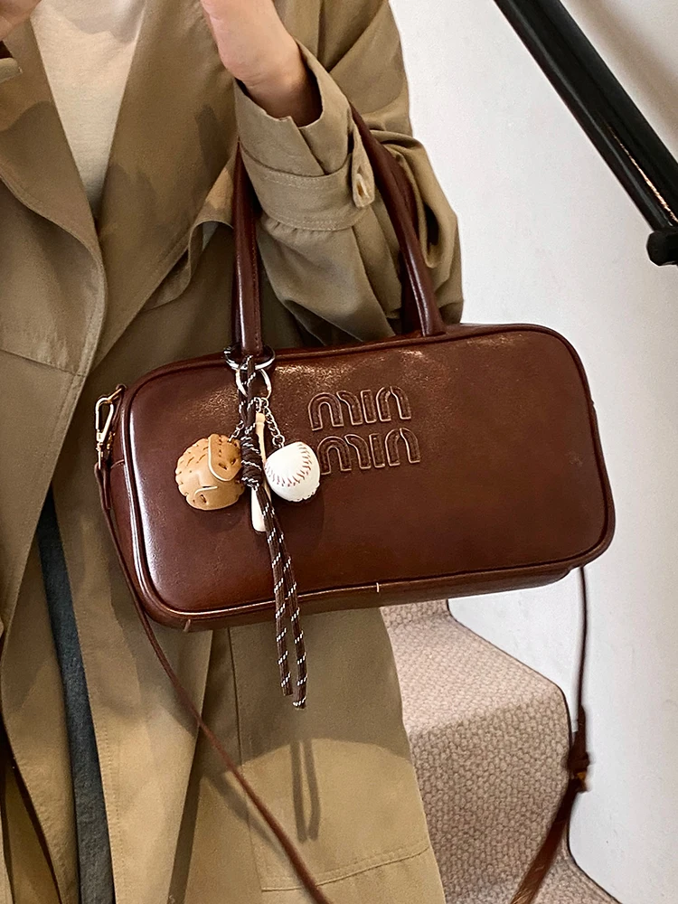 

Luxury designer bowling bag female 2025 spring and autumn all-match large-capacity commuter portable one-shoulder messenger bag