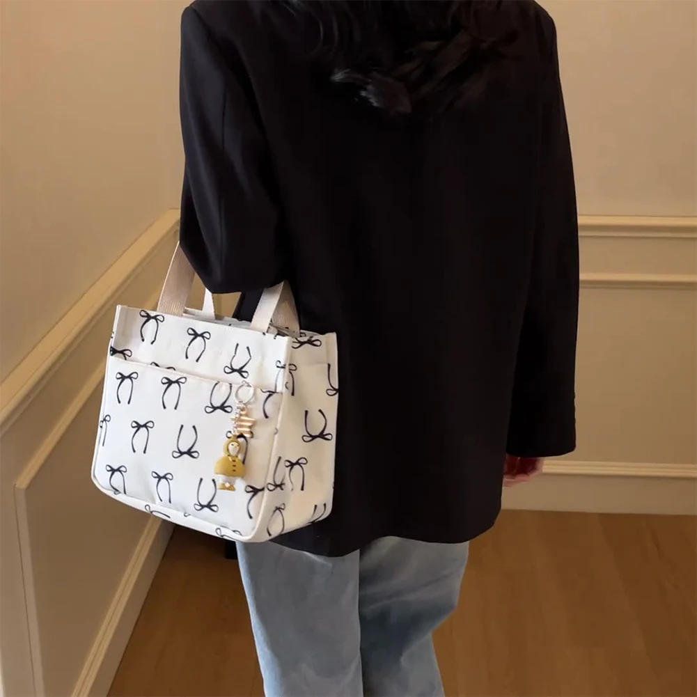 حقيبة يد كاجوال مع مقبض على شكل فيونكة وحقيبة رسائل للنساء للعمل والنزهات على الشاطئ