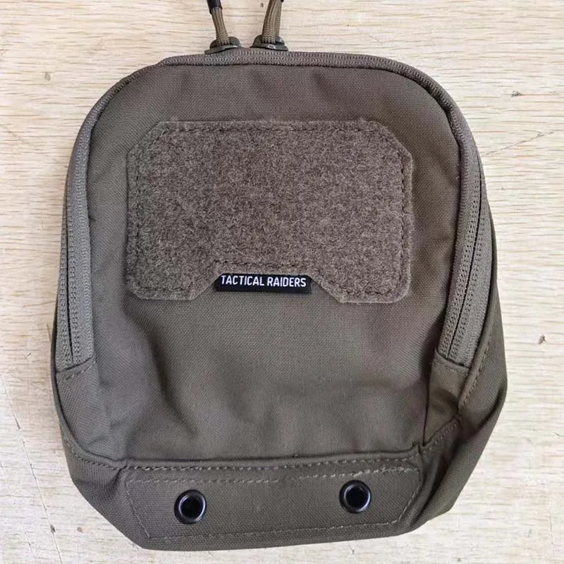 

Tactical folding storage pouch for outdoor use, functioning as a general-purpose (GP) waist bag or an NVG gear organizer.