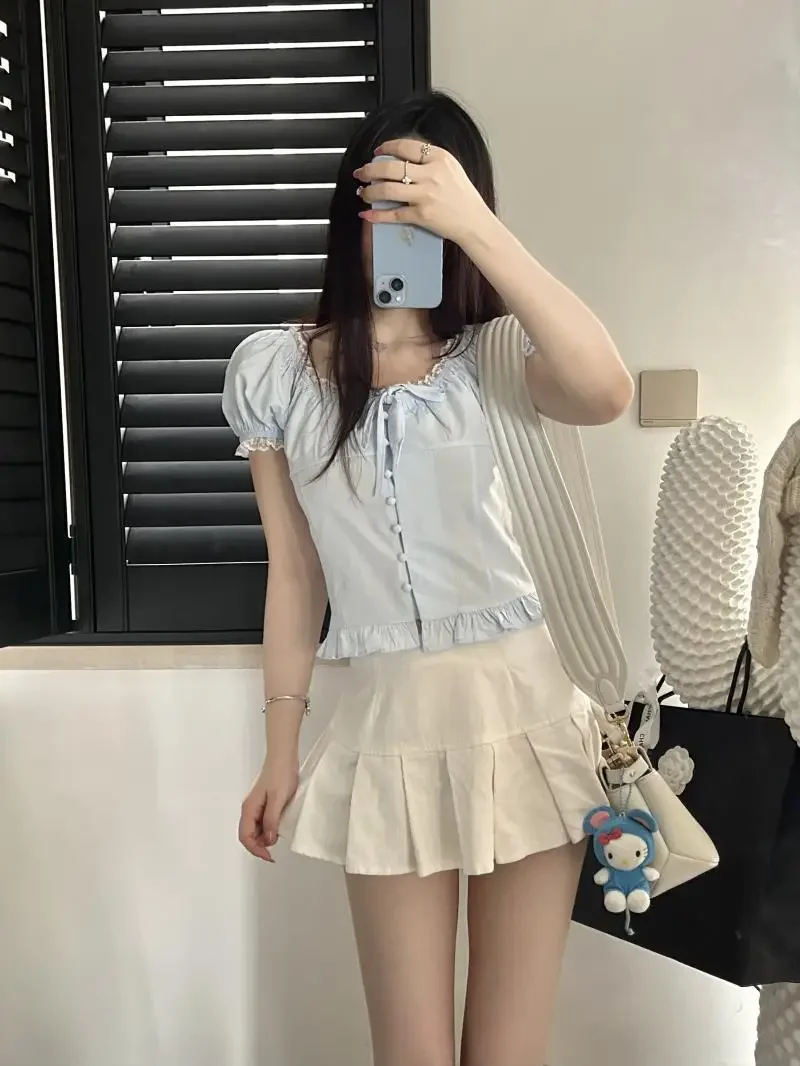 

Нежная французская блузка с короткими рукавами и оборками, летняя, с завышенной талией, приталенная, элегантная, на одной пуговице