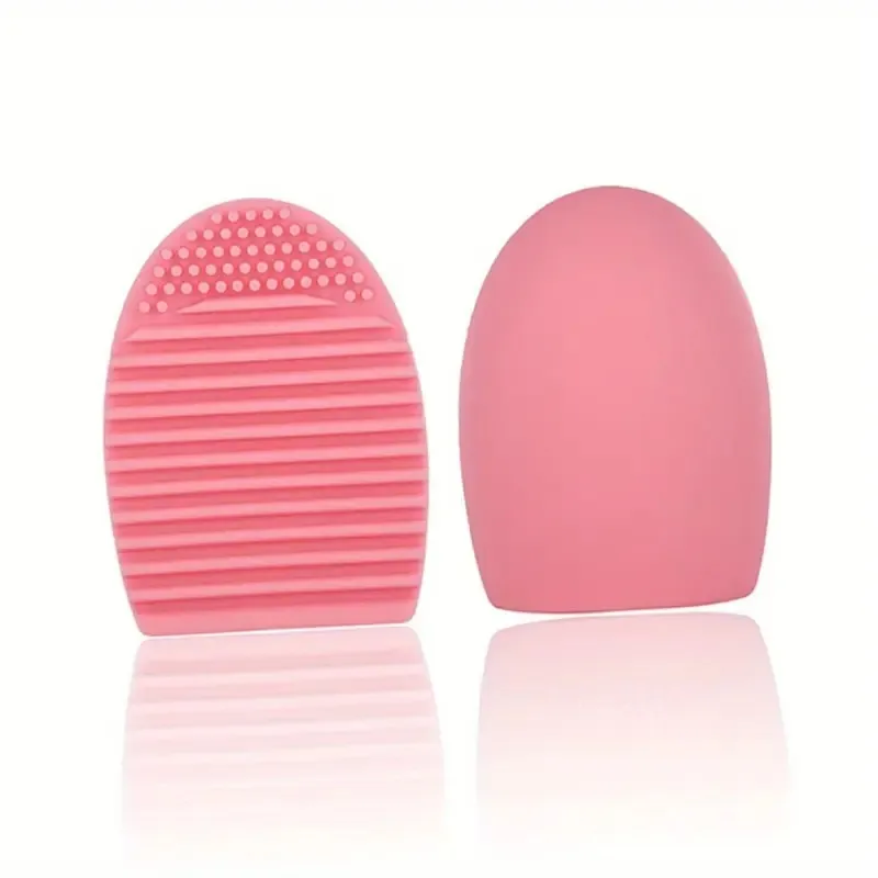ピンクのシリコンメイクブラシクリーナー - テクスチャ表面を備えた卵型のクイッククリーニングツール、無臭、耐久性があり、毎日のブラシに最適
