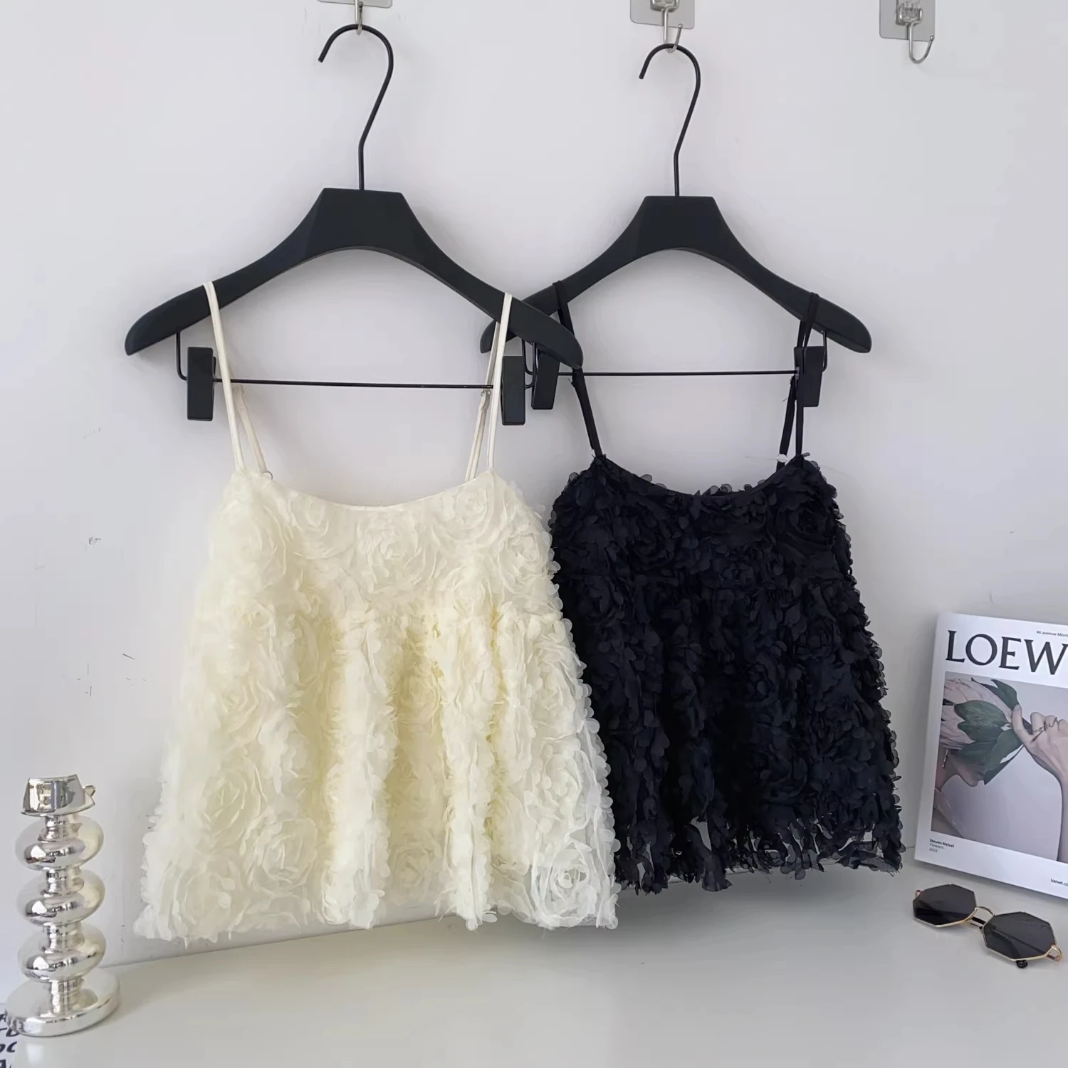 

Clothland Women Sweet White Black Floral Camis Spaghetti Straps Sleeveless Backless Cute Summer Crop Top WA439