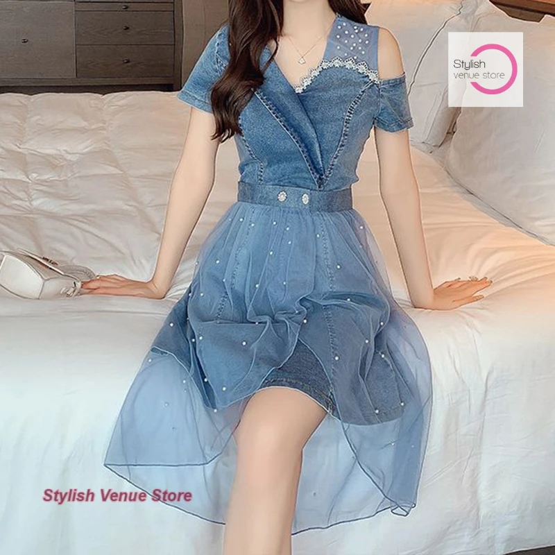 

Korean denim dress gauze two-piece women's summer new Korean version of the new loose western fashion design sense skirt.