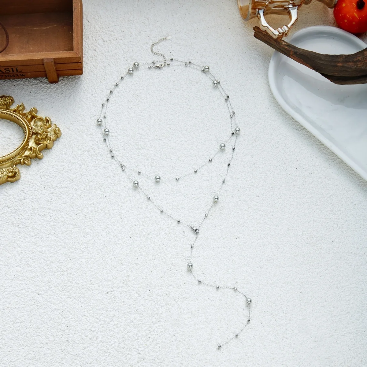 Zierliche silberfarbene Perlen-Stern-Schmuckkette mit simulierten Perlen in Y-Form für Damen und Herren, doppellagiger Y-förmiger Choker, ästhetisches Geschenk-Schmuckstück. – Detail 25