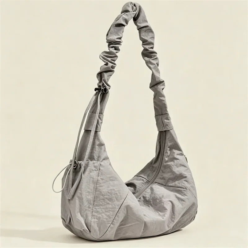 Nylon Multi-Pocket Shoulder Underarm Bags for Woman Featuring Wrinkled Design with Drawstring Perfect for Relaxed Versatile Look