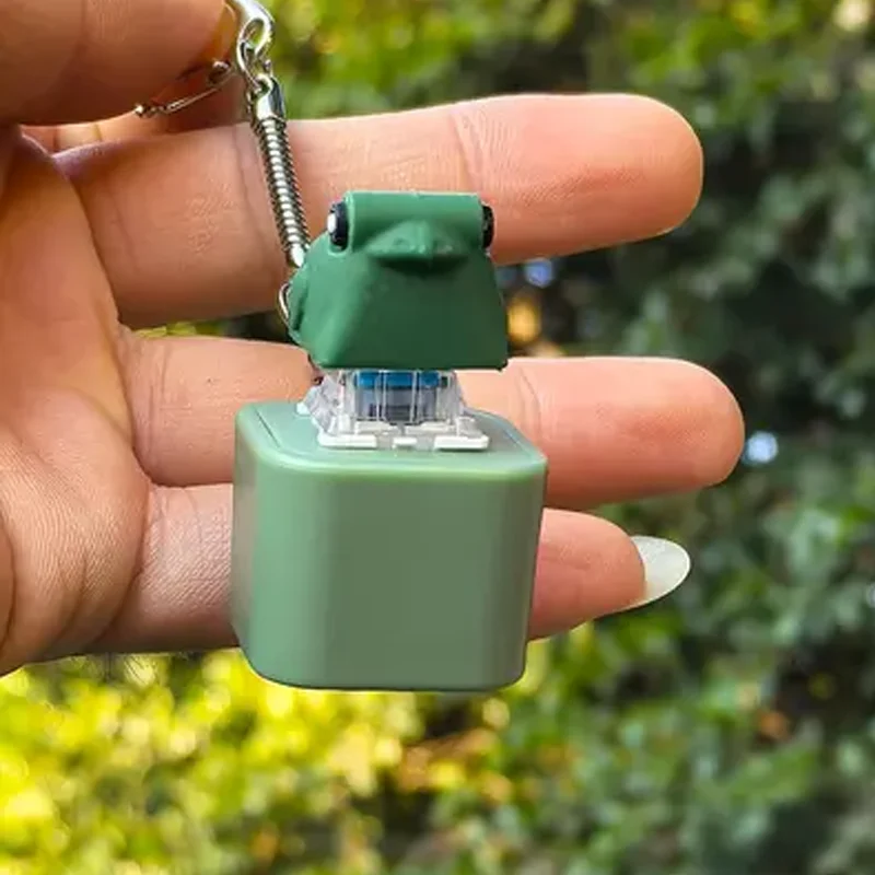 الإبداعية كراكينج الضفدع المفاتيح مع أضواء ملونة إصبع زر الفرس مثيرة للاهتمام الضفدع انتزاع الإجهاد الإغاثة سلاسل المفاتيح